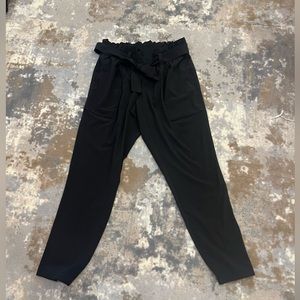 Athleta loose leg pant with tie belt details and pockets